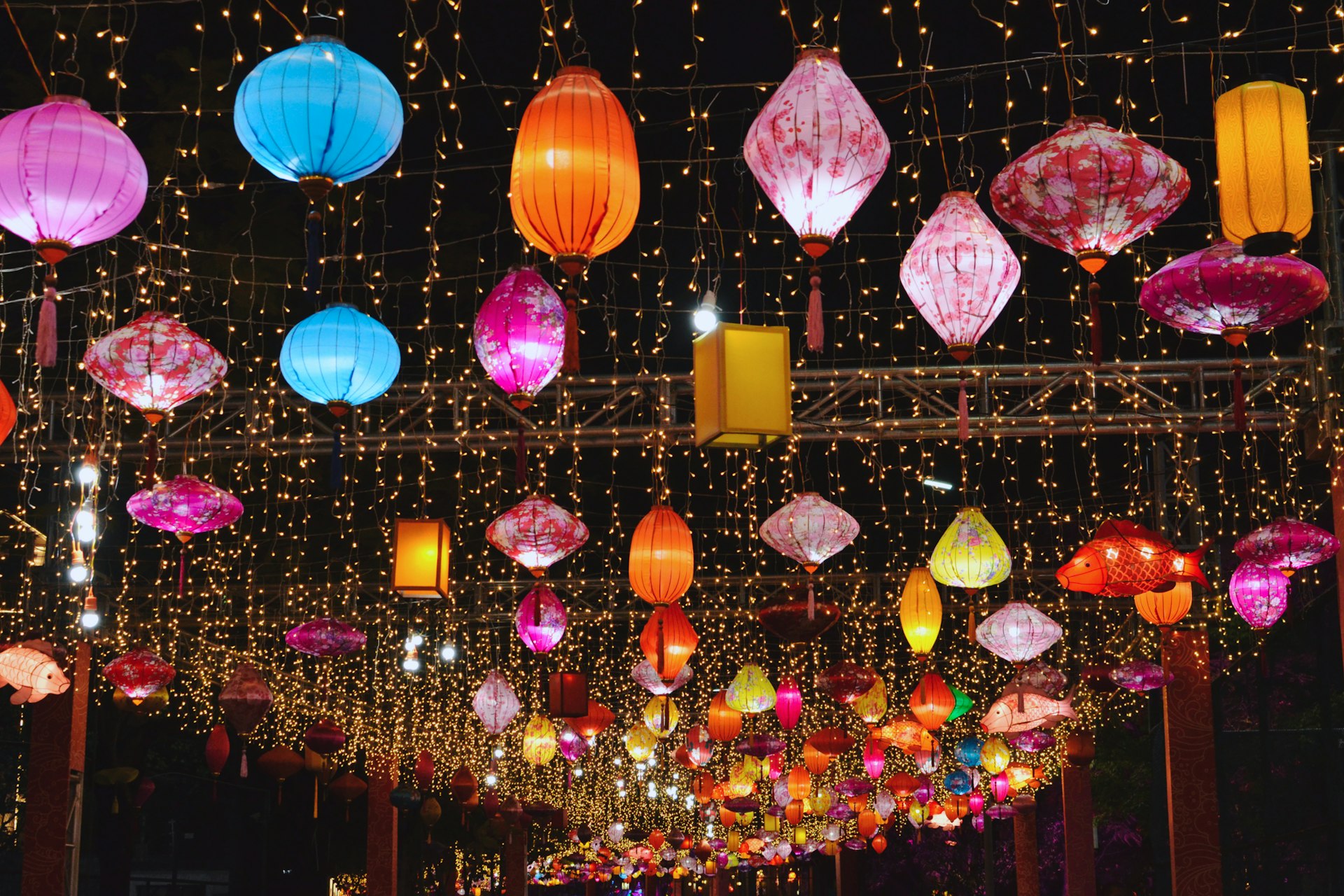 a wall with lanterns from it